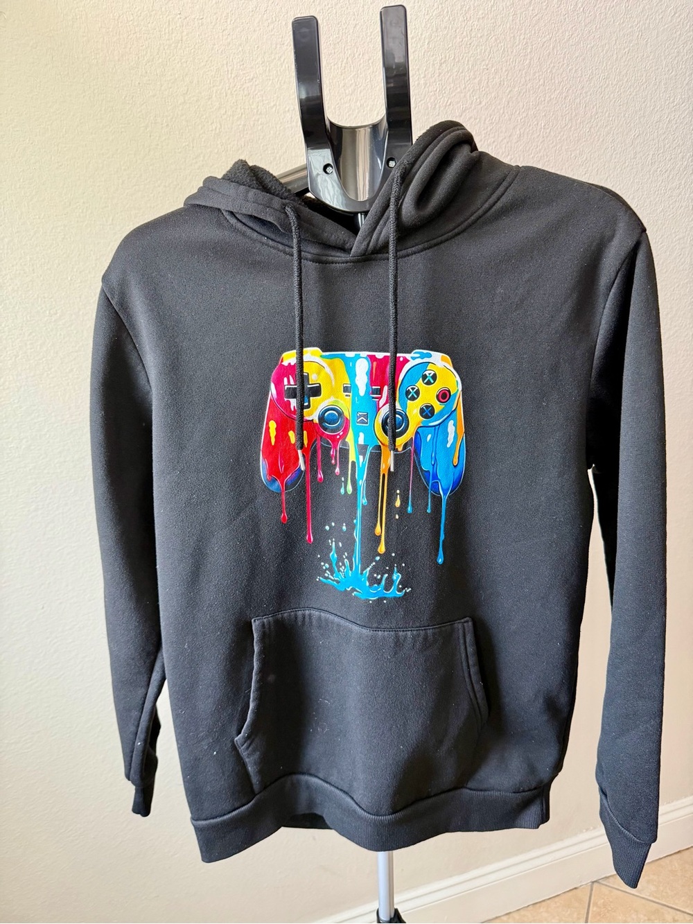 Black Crewneck Hoodie with Multicolor Dripping Game Controller Graphic